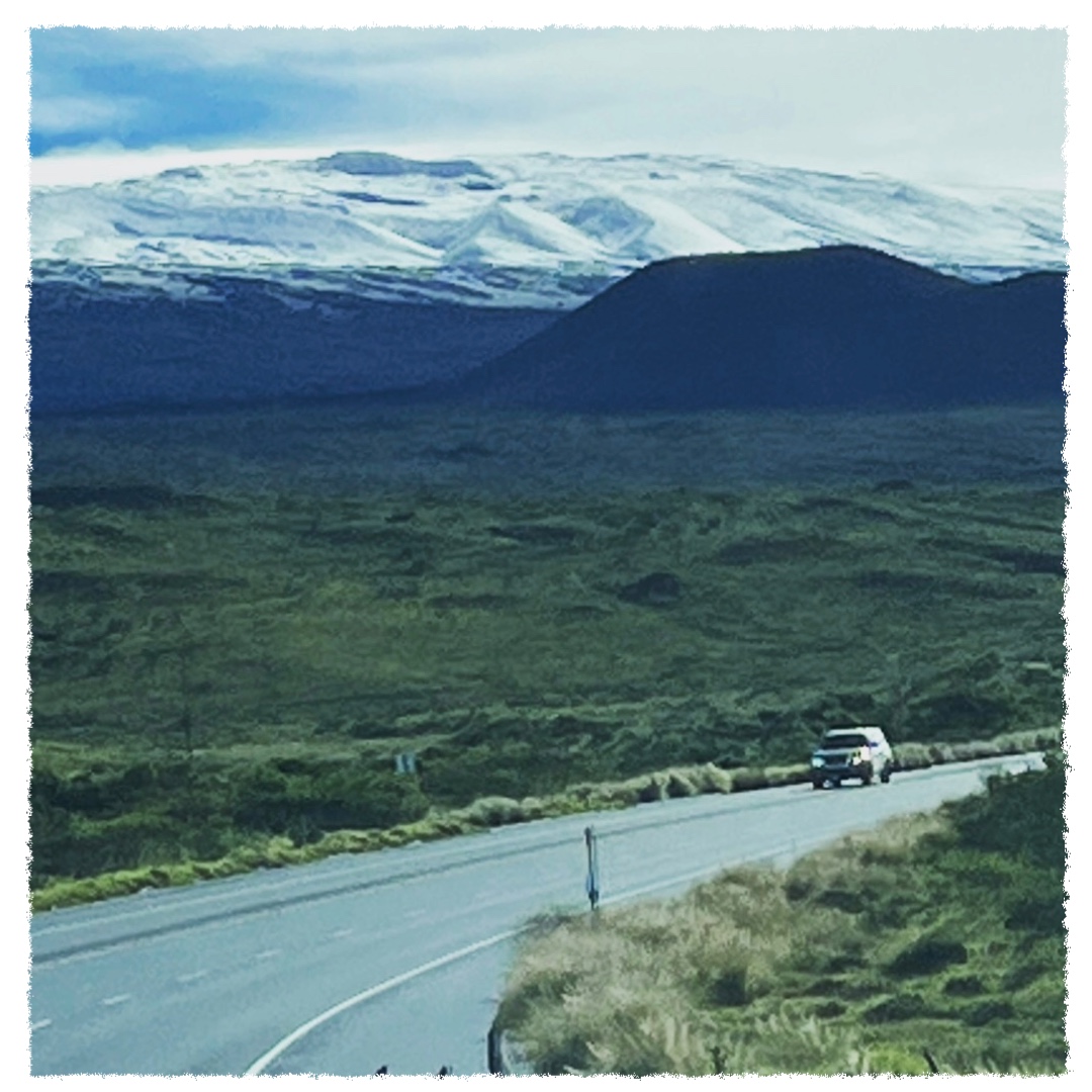 Saddle Road crossing the Big Island of Hawaiʻi with Mauna Kea in the distance
