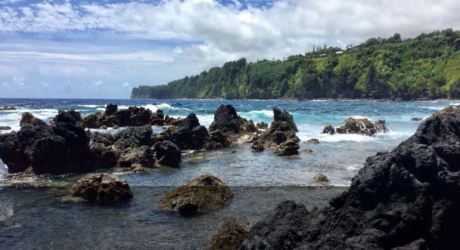 Rocky volcanic shoreline and crashing waves at Laupāhoehoe Point on the Hāmākua Coast of the Big Island of Hawaiʻi.