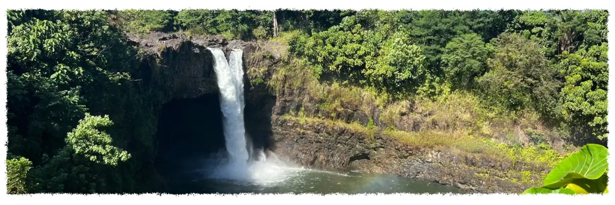 Rainbow Falls cascading into a rainforest basin near Hilo on the Big Island of Hawaiʻi.
