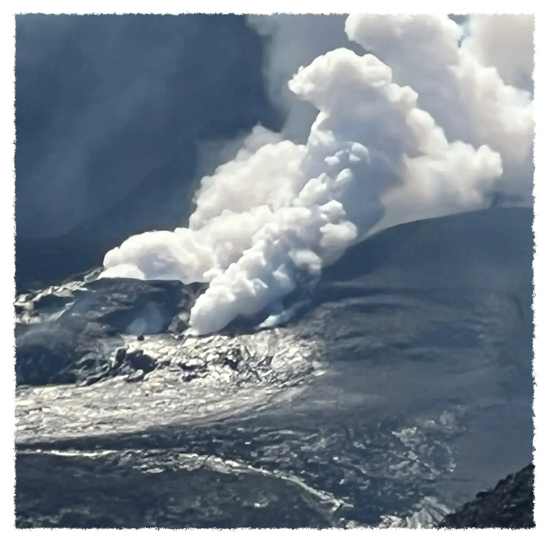 Steam rising from Kīlauea Caldera, highlighting active volcanic terrain inside Hawai‘i Volcanoes National Park.
